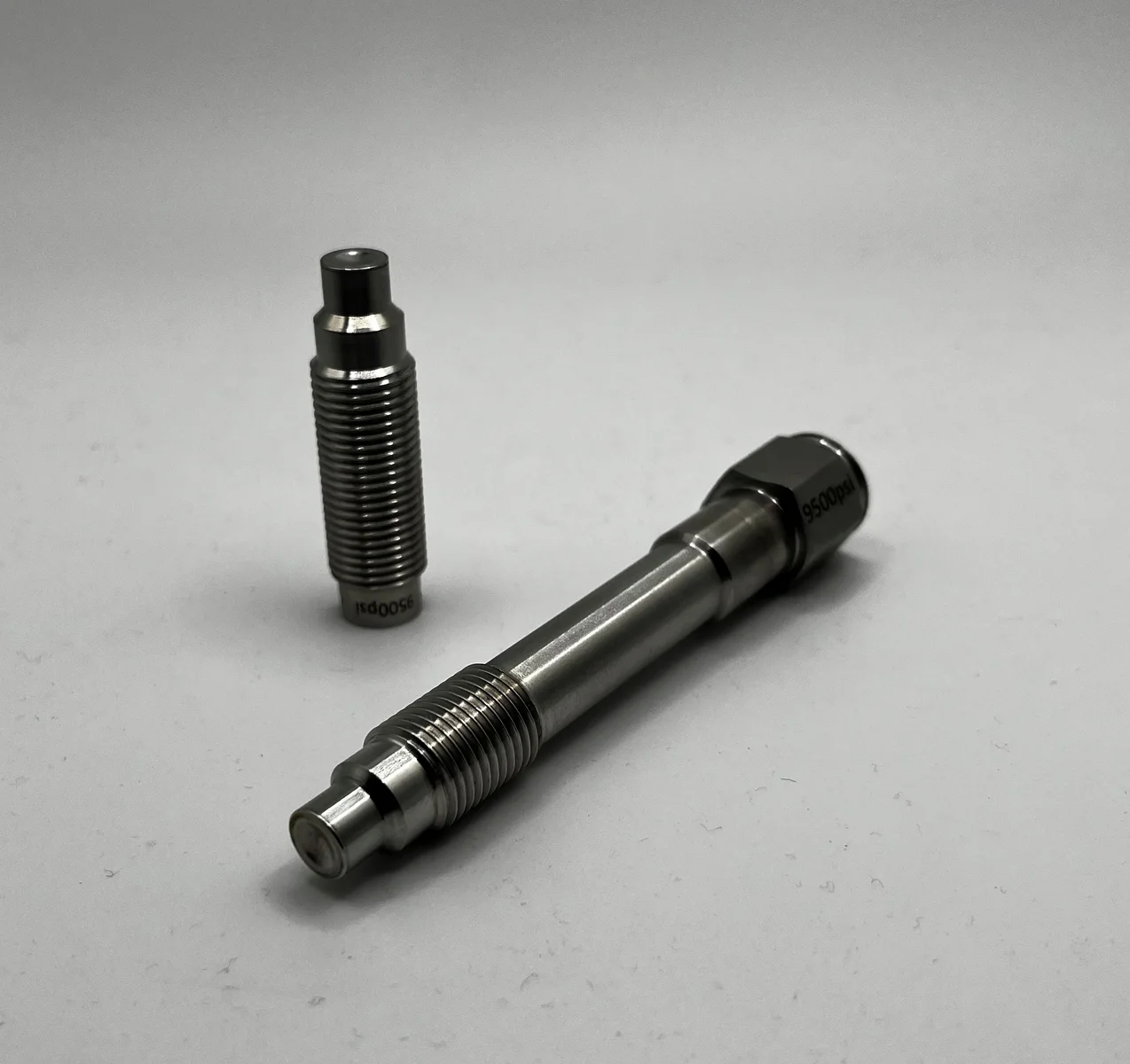 Pressure relieving burst plugs